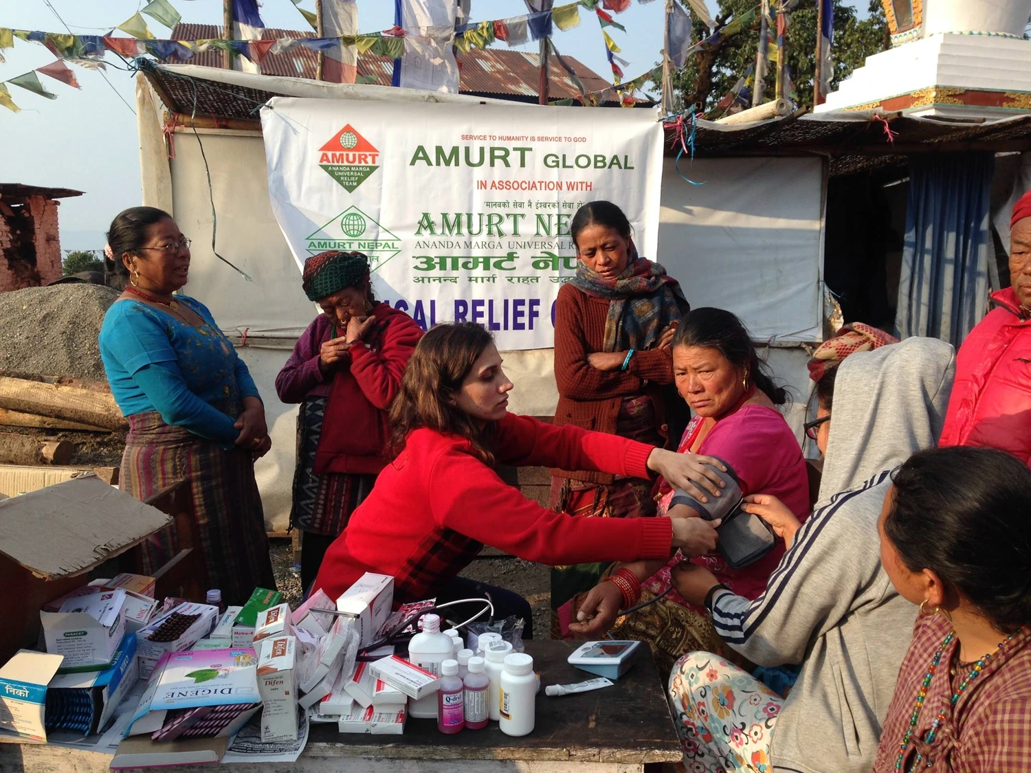 AMURT and AMURTEL free medical camp reaching a remote village in Nepal after the 2015 earthquake